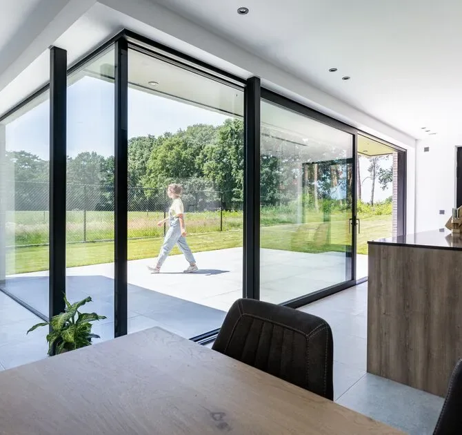 Reynaers MasterPatio sliding glass door with open glass corner