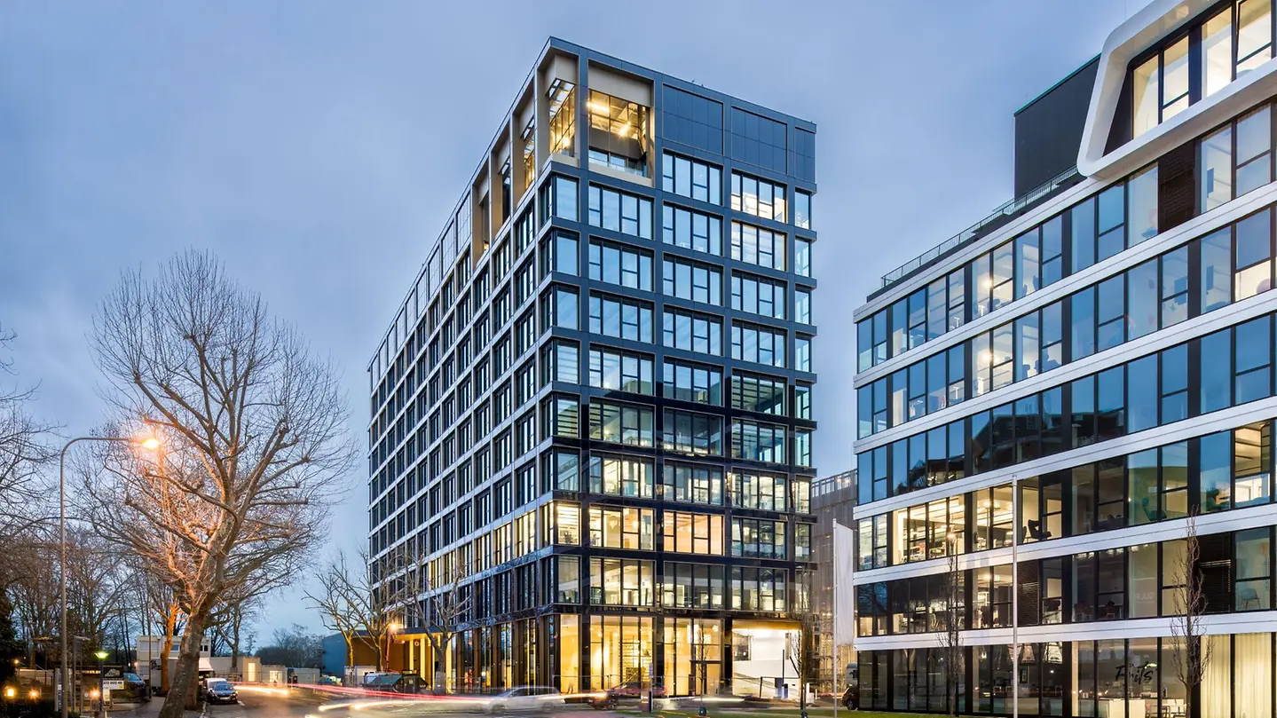 Commercial towers with coordinated Schüco aluminum curtain wall façades