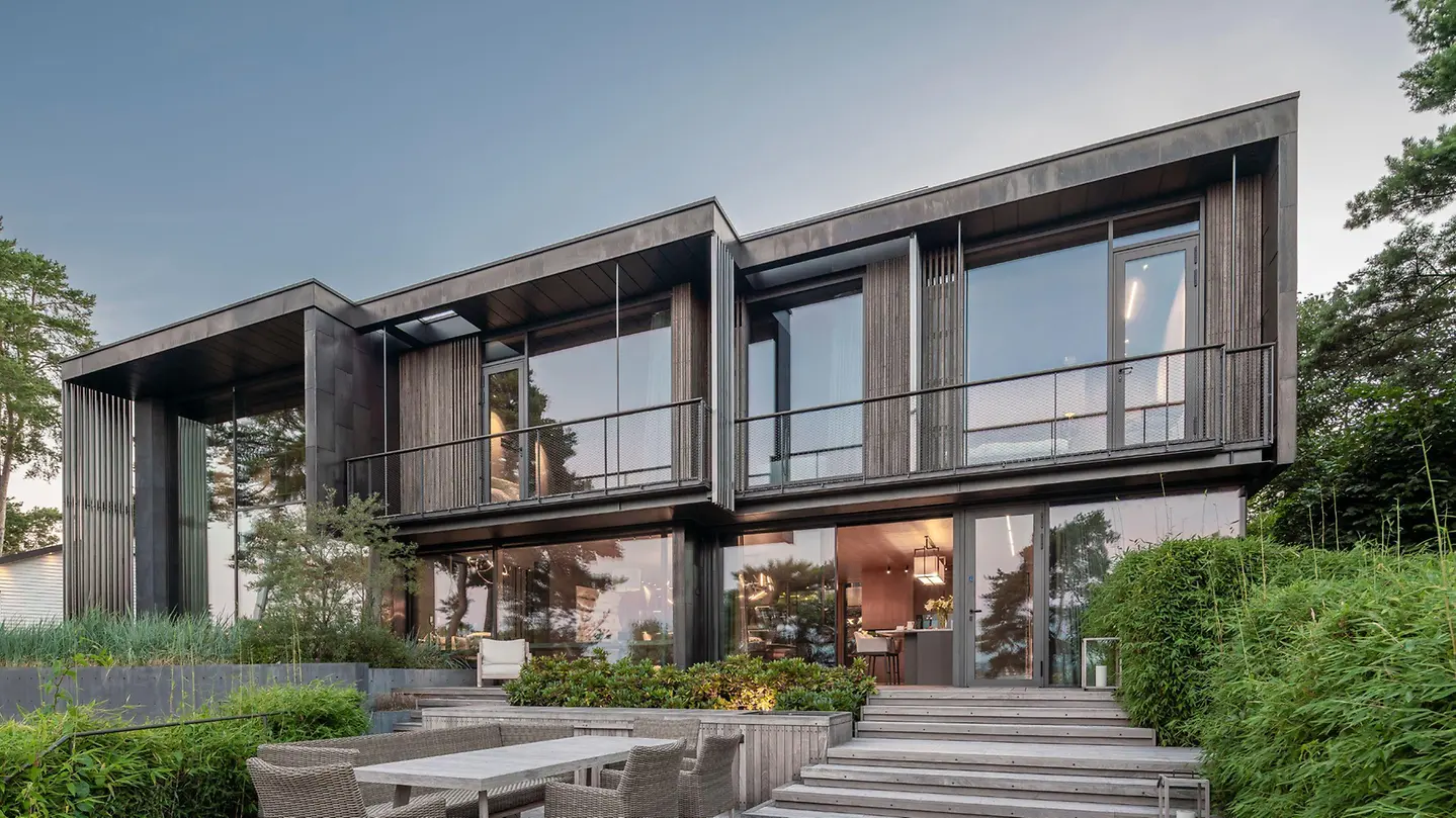 Contemporary house with floor-to-ceiling Schüco façade glazing