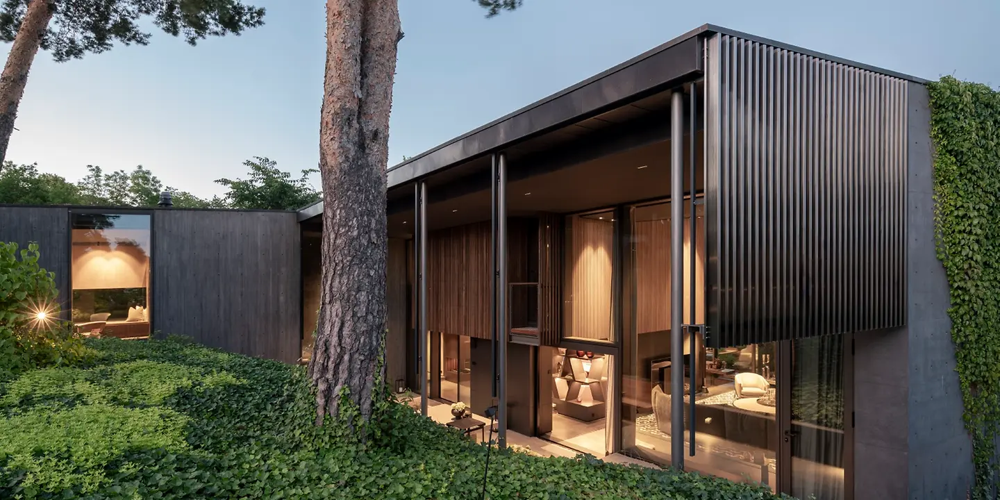 Modern villa with Schüco façade glazing and vertical shading fins